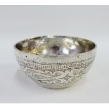 Nigerian silver bowl with stylised engraved pattern, inscribed Onitsha, 8.5cm diameter