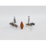 Two miniature silver junk boats, each stamped Sterling Hong Kong, 6cm high together with a small