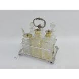 Epns and glass bottle condiment stand, 22cm high