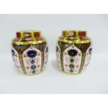 A pair of Royal Crown Derby Old Imari pattern 1128 ginger jars and covers, with red printed