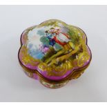 Porcelain trinket box and cover with gilt metal mounts, the pink ground painted with figures and