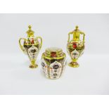 Two Royal Crown Derby Imari pattern 1128 porcelain urn vases with covers together with a ginger