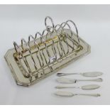 Large Epns toastrack and set of four Sheffield silver butter knives (5)