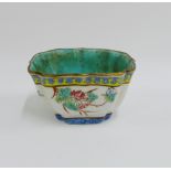 Small Chinese Famille Rose square shaped dish with yellow and blue borders and floral sprays with