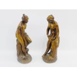 Pair of bronze patinated female nude figures, 35cm high, (2)