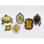 A collection of vintage miniature gilt metal photograph frames together with a portrait miniature on