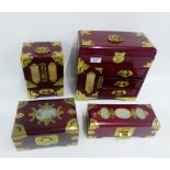 Collection of four Chinese stained hardwood boxes with brass mounts and inset jadeite plaques,