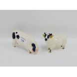 Beswick black and white faced Ram, together with a Royal Doulton black and white pig, with printed