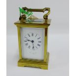 Late 19th century brass carriage clock, complete with key, 15cm high, including handle