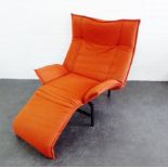 1980's orange upholstered lounger on black metal supports, 112 x 100cm