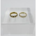 Two 9 carat gold gemset eternity rings (2)