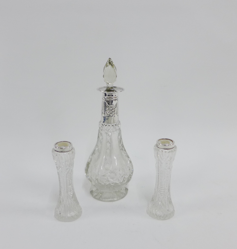 George V silver mounted glass scent bottle and stopper, Birmingham 1915, 20cm high together with a