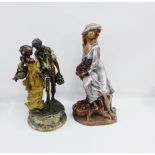 Bronze patinated resin Male and Female figure group on a circular hardstone base, 41cm high,