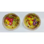 A pair of Royal Worcester fruit bowls by H Ayrton, both signed and painted to a mossy ground, one