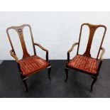 Pair of mahogany open armchairs with shaped top rail and carved splat over upholstered slip in