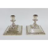 George III silver desk candlesticks on square stepped bases by Ebenezer Coker, London 1760 (2)