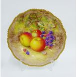 Royal Worcester fruit study cabinet plate painted by H Ayrton, signed, with a gilt edged gadroon