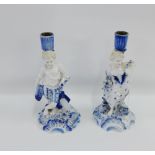 Pair of Dresden porcelain Male and Female figural blue and white candlesticks, each figure