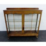 Mahogany ledgeback display cabinet, with pair of glazed doors, shelved interior and cabriole legs,