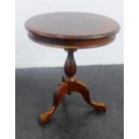 Mahogany pedestal wine table with carved tripod legs and ball and claw feet, 70 x 60cm