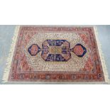 Super Keshan rug with red and ivory field, 215 x 142cm