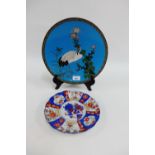 Cloisonne charger with Crane and Chrysanthemum pattern, together with an Imari plate, largest 30cm