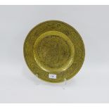 Chinese bronze circular charger with Dragon pattern and character marks verso, 31cm across