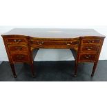 19th century mahogany and inlaid serpentine sideboard with central long drawer flanked by three