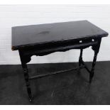Black painted fold-over card table with castors, 76 x 91cm