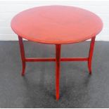 Red painted circular topped side table, 46 x 62cm