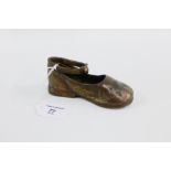 Child's bronze shoe, 14cm long