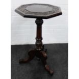 Mahogany pedestal table, the octagonal top with carved foliate border, on tripod legs, 75 x 42cm