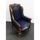 Mahogany framed wing-back chair with cabriole legs and castors, 115 x 50cm