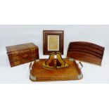Art Deco oak tray, a pair of mixed wood bookends, a stationary rack, an inlaid writing box and a