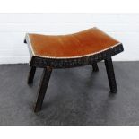 Foot stool with curved upholstered top and on carved hardwood legs, 38 x 54cm