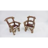 Pair of salt glazed miniature pottery garden seats, 18cm high (2)