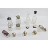 A quantity of silver and Epns topped bottles and jars together with a pair of glass and silver