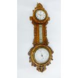 Oak cased wall barometer and clock