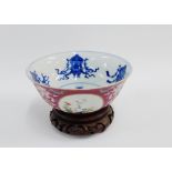 Chinese Imperial pattern porcelain bowl, the exterior with pink ground and hand painted floral