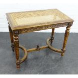 Carved oak table / stool, with canework top, turned legs and Carolean style stretcher, 50 x 60cm