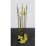 Brass fireside companion set, 82 x 20cm