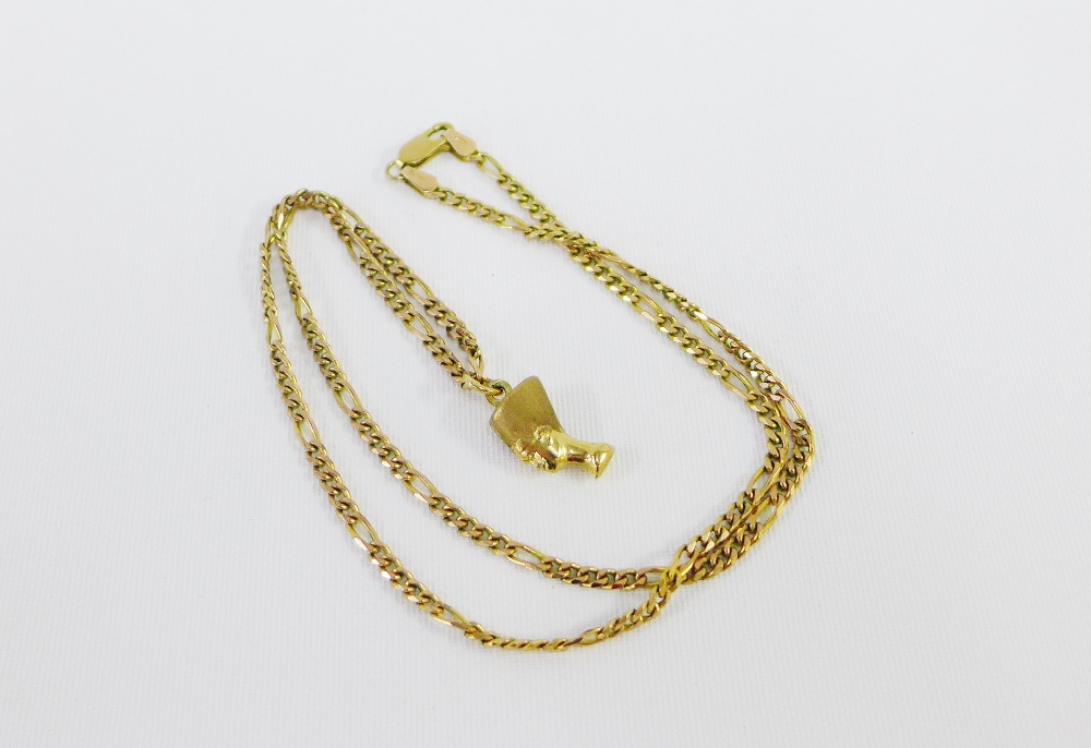 9 carat gold Nefertiti pendant on a 9 carat gold chain, both stamped 375