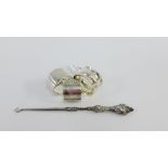 Three silver napkin rings, mixed dates and makers together with a silver handled button hook (4)