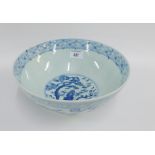 Chinese blue and white bowl, the exterior painted with figures in a garden landscape with prunus and