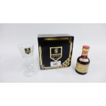 Box of Edinburgh Crystal glass, together with a miniature bottle of Drambuie