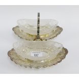 Epns and glass stand containing two navette shaped glass bowls