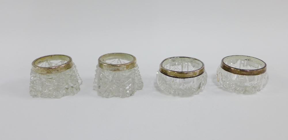 Two pairs of Birmingham silver mounted open glass salts (4)