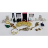 Mixed lot to include two silver dress rings and another, a silver brooch and various costume