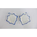 Two English leaf shaped blue and white pickle jars with feather edged borders, 16cm long, (2)