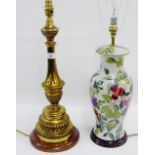 Faux giltwood metal table lamp base together with a ceramic table lamp, (2)